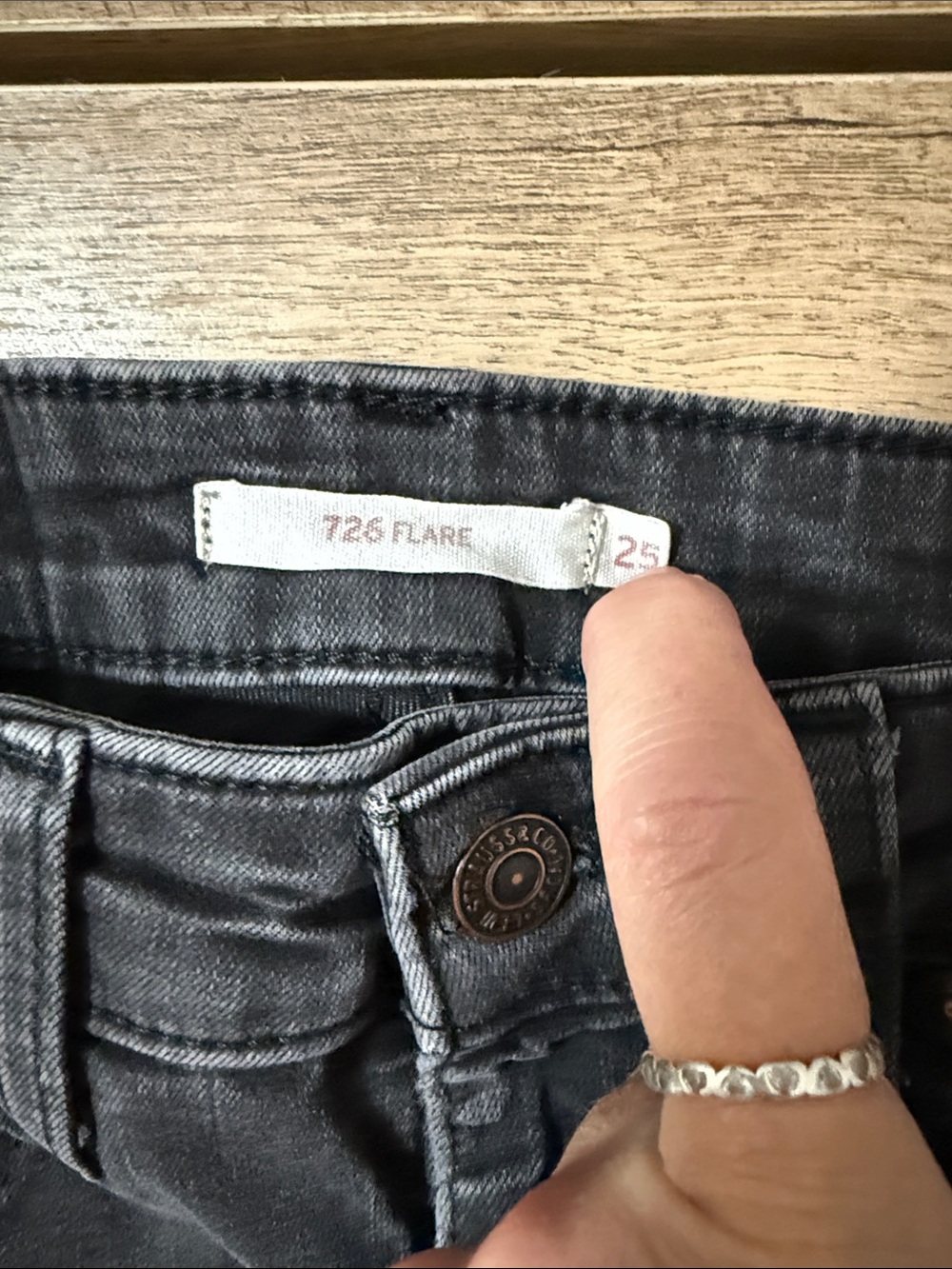 Women's Jeans in Washed Black - tag shows Size 25 but measures now as 23” w